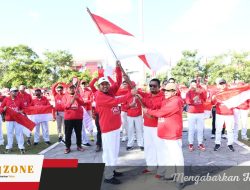 Bupati Sumenep Serahkan Bendera Merah Putih kepada ASN, Dorong Semangat Nasionalisme